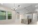 An open-concept living space with abundant natural light and modern finishes, perfect for entertaining at 10 Dial Ave, Debary, FL 32713