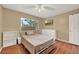 Well-lit bedroom with a large window, ample natural light and neutral colors at 1090 Sonoma Ct, Longwood, FL 32750