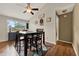 Open dining room features wood flooring, transitional decor and views to the lanai at 1090 Sonoma Ct, Longwood, FL 32750