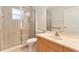 Bathroom with a tile shower and vanity at 1154 Feather Dr, Deltona, FL 32725