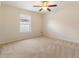 Bedroom with a ceiling fan and neutral carpet at 1154 Feather Dr, Deltona, FL 32725