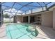 Refreshing screened-in pool and patio area, offering an ideal outdoor leisure space for relaxation and entertainment at 1154 Feather Dr, Deltona, FL 32725
