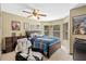 Bedroom featuring decor, a ceiling fan, and lots of natural light at 1225 Hollow Pine Dr, Oviedo, FL 32765