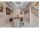 Refined dining room featuring a wooden table, seating for six, and elegant decor, perfect for Gathering gatherings at 1225 Hollow Pine Dr, Oviedo, FL 32765