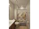 Bathroom showcasing a vanity, toilet and a shower with a patterned curtain at 1259 Pando Loop, Orlando, FL 32824