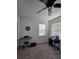 Bedroom featuring a ceiling fan, desk and window views at 1259 Pando Loop, Orlando, FL 32824