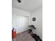 Bedroom with door, closet, keyboard and weights at 1259 Pando Loop, Orlando, FL 32824