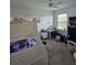 Bright bedroom with a ceiling fan, and large windows at 1259 Pando Loop, Orlando, FL 32824