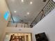 Second-floor view shows the open floor plan and staircase to the kitchen and living area at 1259 Pando Loop, Orlando, FL 32824