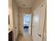 Hallway with a view of the bedroom at 1259 Pando Loop, Orlando, FL 32824