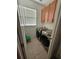 Neat laundry room featuring modern machines and storage cabinets at 1259 Pando Loop, Orlando, FL 32824