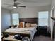 Spacious main bedroom featuring a ceiling fan, ample natural light, and neutral walls at 1259 Pando Loop, Orlando, FL 32824