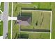 A birds eye view showing a homes fenced in back yard with trampoline and manicured lawn at 12835 Del Lago Dr, Astatula, FL 34705