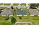 Residential homes shown from an aerial view in a quiet neighborhood with lush green lawns at 130 Winsor Ave, Davenport, FL 33837
