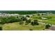 Aerial shot showcasing the development potential of a large plot, close to commercial development at 130 Winsor Ave, Davenport, FL 33837