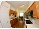 Well-lit kitchen featuring stainless steel appliances at 130 Winsor Ave, Davenport, FL 33837