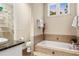 Bathroom with a soaking tub and a storage area at 1443 Stone Trl, Enterprise, FL 32725