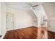 Bright bedroom with hardwood floors, neutral walls, ceiling fan, and a unique hammock chair at 1443 Stone Trl, Enterprise, FL 32725