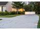 Long driveway leading to the home, featuring landscape lighting and mature plants at 1443 Stone Trl, Enterprise, FL 32725