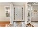 Elegant foyer with tile flooring and a view into adjacent rooms at 1443 Stone Trl, Enterprise, FL 32725