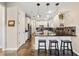 Bright eat-in kitchen with granite countertops, tile floors and breakfast bar at 1443 Stone Trl, Enterprise, FL 32725