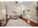 Spacious living room with hardwood floors, high ceilings and lots of light at 1443 Stone Trl, Enterprise, FL 32725