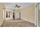 Bedroom featuring tile flooring, natural light, and closet space at 1455 Royal Forest Loop, Lakeland, FL 33811