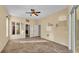 Bedroom featuring tile flooring, ceiling fan, and neutral wall color at 1455 Royal Forest Loop, Lakeland, FL 33811