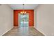 Dining area with tile flooring, sliding glass doors to the outdoors and neutral walls at 1455 Royal Forest Loop, Lakeland, FL 33811