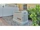 Generac standby generator installed on a gravel pad for emergency power at 1455 Royal Forest Loop, Lakeland, FL 33811