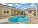 Relaxing screened-in pool with lots of sunshine and an ample deck with plenty of space for activities at 1455 Royal Forest Loop, Lakeland, FL 33811