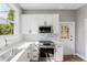 Modern kitchen with stainless steel appliances, white countertops, and well-lit space at 1480 Wauchula St, Intercession City, FL 33848