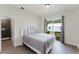 Main bedroom with an ensuite bathroom and walk out access to the back yard at 1480 Wauchula St, Intercession City, FL 33848