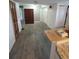 Open living area with access to doors and view to other rooms at 1519 Illinois Ave, St Cloud, FL 34769