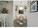 Bright dining area featuring a round table with seating and built-in shelving at 1600 Dauphin Ln, Orlando, FL 32803