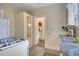 Functional kitchen with white appliances, granite countertops, and tile flooring at 1600 Dauphin Ln, Orlando, FL 32803