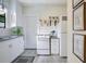 Well-lit kitchen with white cabinetry, granite countertops, and stainless steel appliances at 1600 Dauphin Ln, Orlando, FL 32803