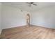 Bedroom with light wood floors and ceiling fan at 16243 Wilkinson Dr, Clermont, FL 34714