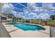 Inviting screened-in pool and spa offer outdoor relaxation and enjoyment at 16243 Wilkinson Dr, Clermont, FL 34714