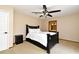 Cozy bedroom features a ceiling fan, neutral walls, and carpet flooring at 173 Tollgate Br, Longwood, FL 32750