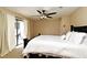 Bedroom featuring sliding glass doors to the backyard and a ceiling fan at 173 Tollgate Br, Longwood, FL 32750