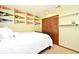 Cozy bedroom featuring sports-themed decor and a spacious closet at 173 Tollgate Br, Longwood, FL 32750