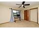 Bedroom featuring a ceiling fan, closet, and space for a desk at 173 Tollgate Br, Longwood, FL 32750
