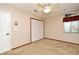 Carpeted bedroom with ceiling fan, closet, and natural light at 173 Tollgate Br, Longwood, FL 32750