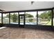 Enclosed patio shows access to a swimming pool, perfect for outdoor relaxation and entertaining at 173 Tollgate Br, Longwood, FL 32750