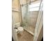 Bathroom with sliding glass shower door and tile flooring at 1813 Glenbay Ct, Windermere, FL 34786