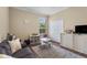 Comfortable bonus room with a large window and ample space for activities at 1813 Glenbay Ct, Windermere, FL 34786
