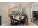 Breakfast nook with lots of natural light and views of the screened-in lanai and pool at 1813 Glenbay Ct, Windermere, FL 34786