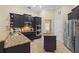 Kitchen with granite countertops, stainless steel appliances and an island with breakfast bar at 1813 Glenbay Ct, Windermere, FL 34786