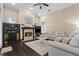 Inviting living room with a cozy fireplace and comfortable seating at 1813 Glenbay Ct, Windermere, FL 34786